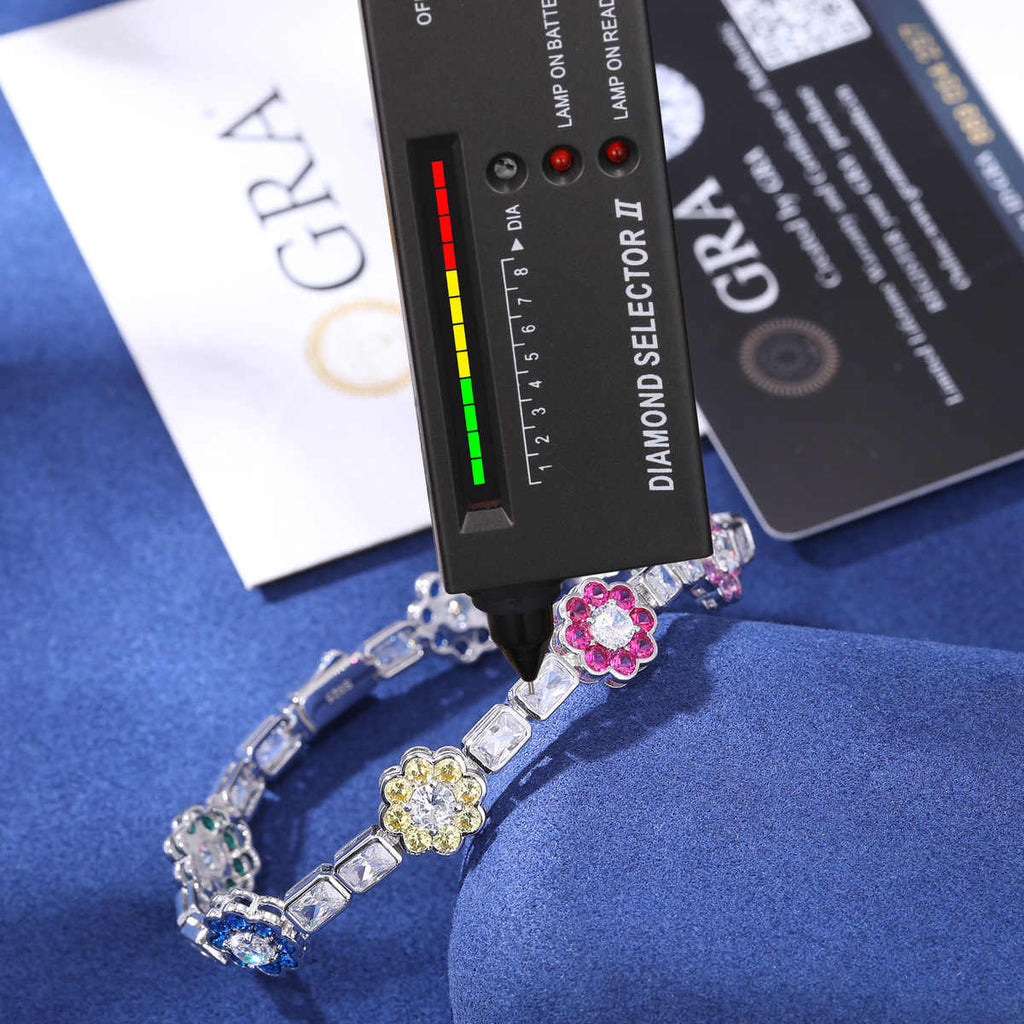 PULSERA DE FLORES COLOREADAS EN MOISSANITA VVS - PLATA 925 - ORO BLANCO - Bling del Barrio