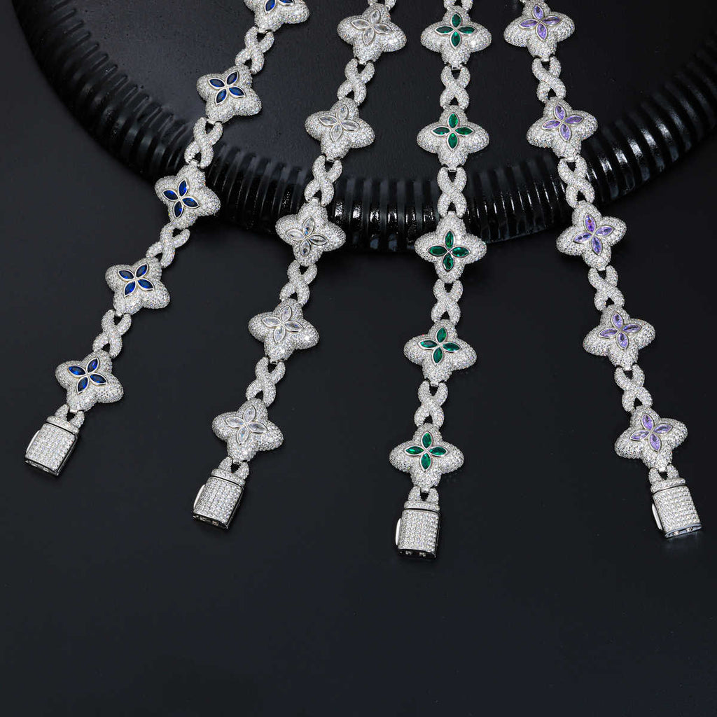PULSERA ESLABONES INFINITOS CON MOISSANITA VVS Y DETALLES DE TRÉBOLES EN CZ DE COLORES - ORO BLANCO - Bling del Barrio
